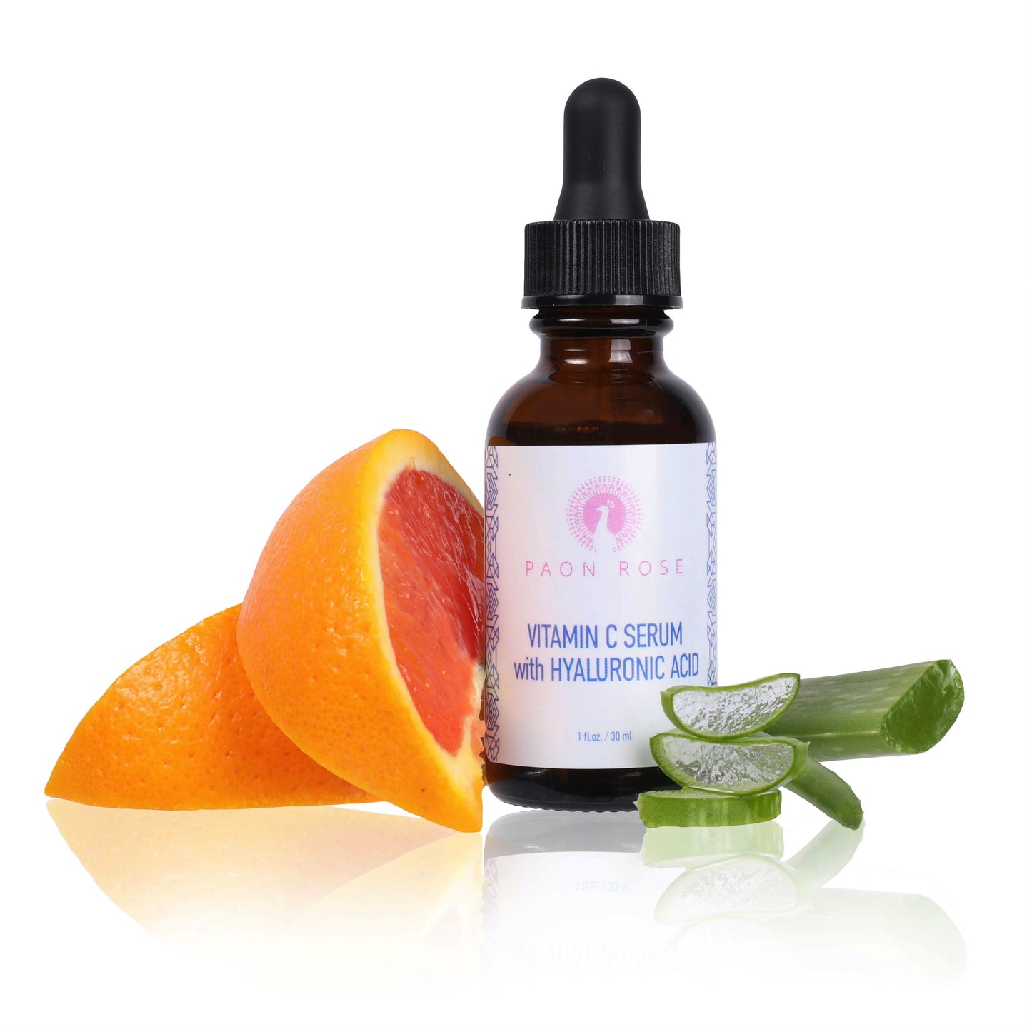 vitamin c serum with hyaluronic acid beside orange and lime slices