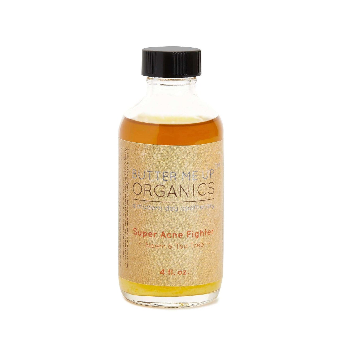 glass bottle of organic pimple treatment face oil with a black lid